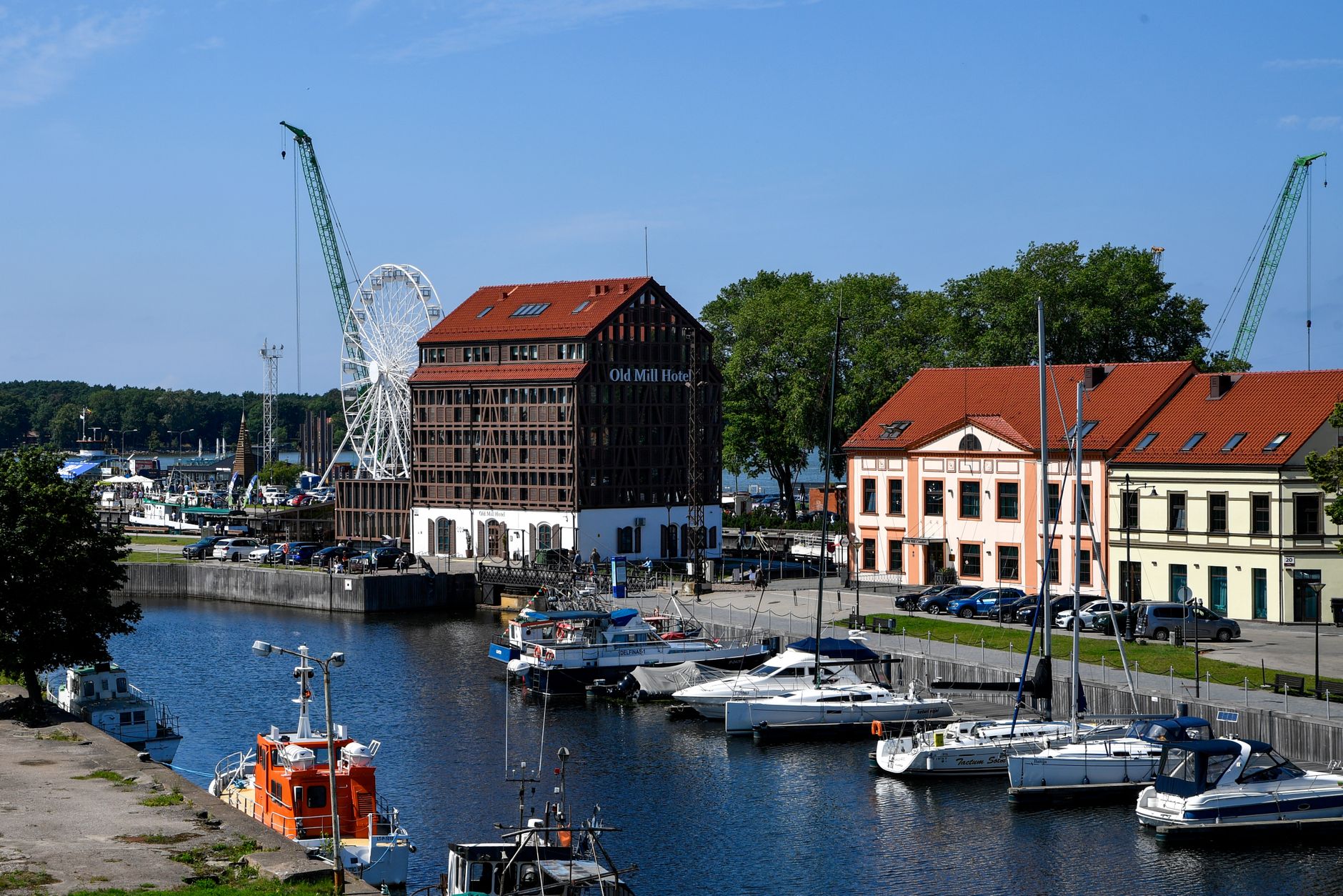 Klaipėda waterfront with Old Mill Hotel and yachts along the canal
